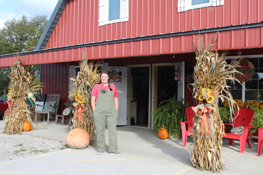 Peyton Andrews stands in front of the shop at Tasty Acres in Springfield, Mo. on October 16, 2026.