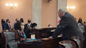 Minority Leader Emilia Sykes (D-Akron) and Speaker Larry Householder (R-Glenford) talk before House session on June 4, 2020, as protestors demonstrate outside the Statehouse. A few moments later, the House held a moment of silence for George Floyd.