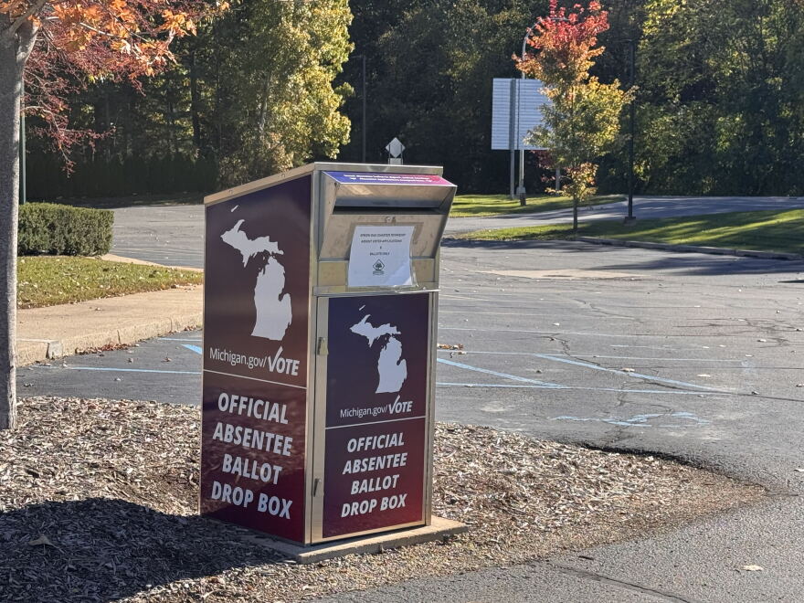 Official Absentee Ballot Drop Box with Michigan logo and Green Oak Charter Township notice.