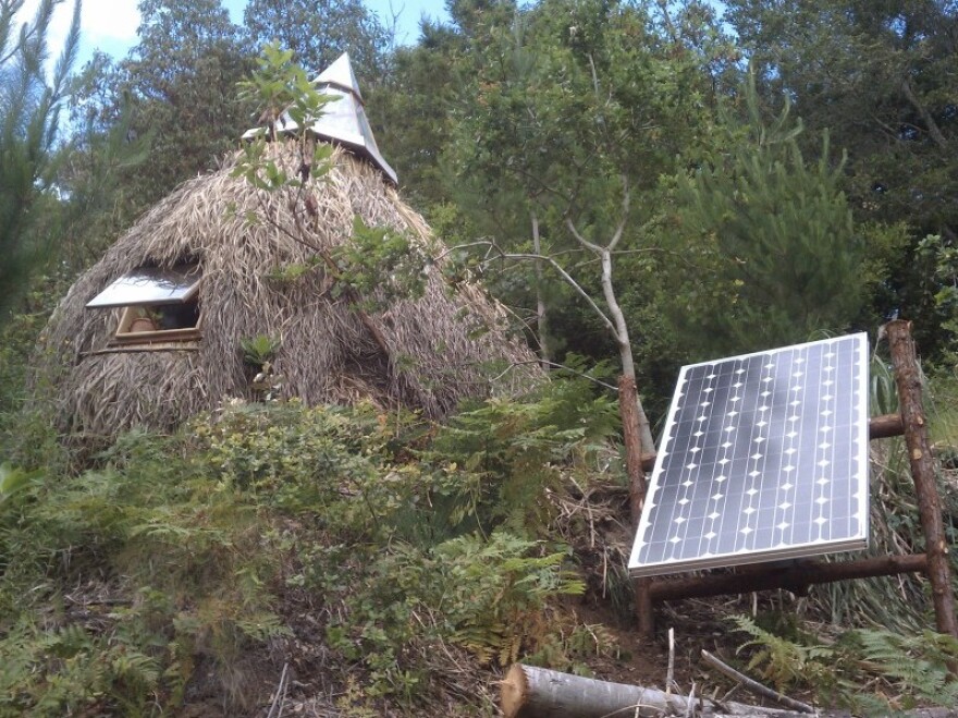 Rabinovitch's grass hut combines a primitive design with more advanced  solar technology. Trout Gulch's 18 residents live in a variety of tiny  homes, huts and tree houses.