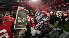 Georgia players celebrate a win over TCU after the national championship NCAA College Football Playoff game, Monday, Jan. 9, 2023, in Inglewood, Calif. Georgia won 65-7. (AP Photo/Ashley Landis)