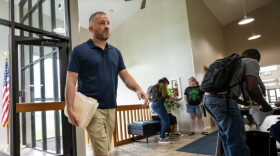 Dennis Brackenridge arrives to the Perry Township Small Claims Court where he has filed eviction notices against a number of residents at Francis Apartments. The court heard eviction cases involving residents of Francis Apartments on May 2, 2025.