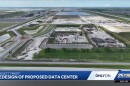 The entryway, left, leads into the property north of Southern Boulevard at 20-Mile Bend where developers want to build the Project Tango data center. The FPL plant is at top left.