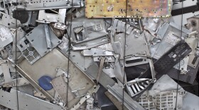 In this 2014 file photo, metal parts from disassembled computer equipment are bundled up ready for recycling in Kenya. Total Reclaim secretly shipped millions of pounds of hazardous e-waste products to Hong Kong, according to court records. 