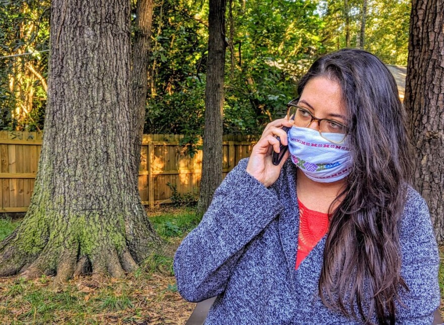 Lakewood Elementary bilingual volunteer Julie Mendoza Grubbs greeting families by phone. (Liz Schlemmer)