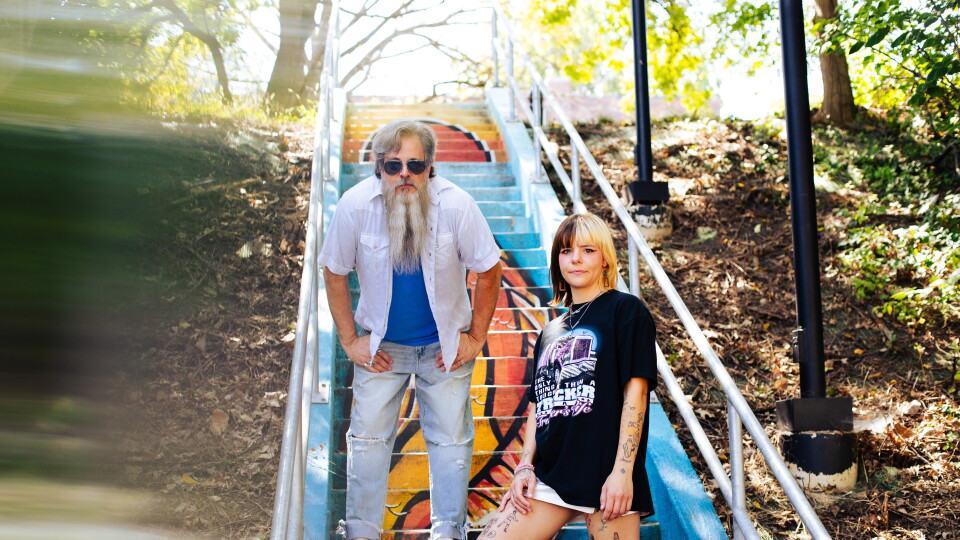 two people posing for a photograph 