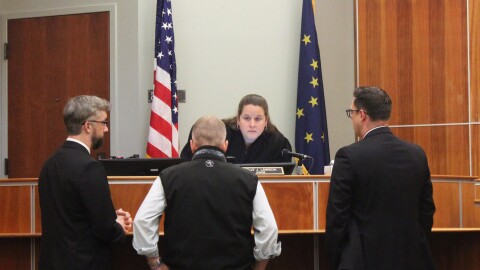 From left, Nathan Erfurth, Eric Derleth, Kelly Lawson and Dan Strigle confer during the first day of Erfurth's trial at the Kenai Courthouse on Monday, July 14, 2025 in Kenai, Alaska.