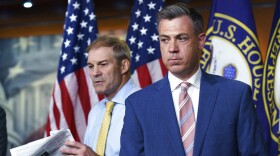 Twitter suspended the account of U.S. Rep. Jim Banks, R-Ind. (right), Saturday after removing a post about a transgender Biden administration official.