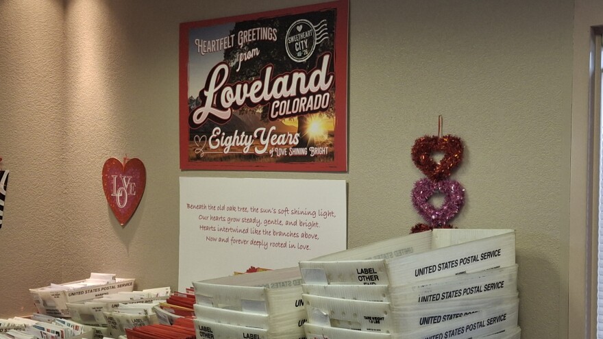 Boxes of Valentine's Day cards from around the world wait to be stamped with the special Loveland stamp on February 2, 2026, at the Loveland Chamber of Commerce in Loveland, Colo. This year marks the 80th anniversary of Loveland's Valentine's Day re-mailing program.