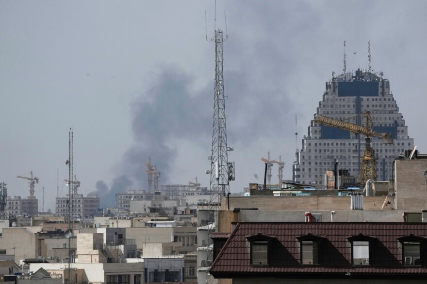 Smoke rises on the skyline after an explosion in Tehran, Iran, Saturday, Feb. 28, 2026.