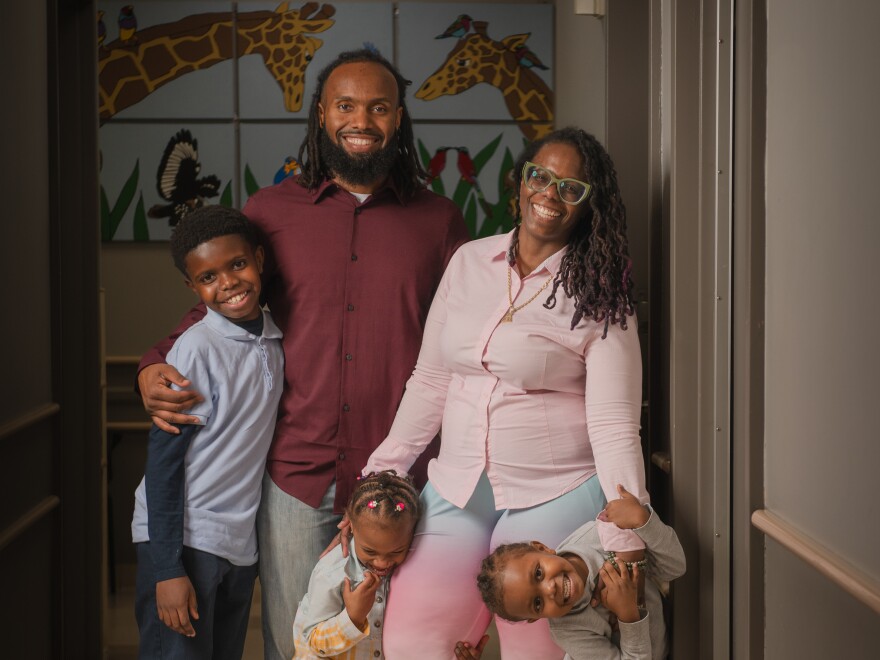 Teresa Cox-Bates and her husband John Bates, along with their kids Eli, Ava and Issac. Teresa says HealthySteps has helped her face her own childhood trauma and be a better parent.