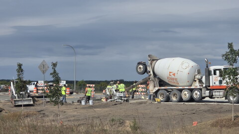 Crews contracted for the Minnesota Department of Transportation's Highway 197 project lay concrete near Bemidji's Menards on Sept. 3, 2026.