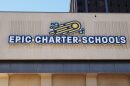 Epic Charter School laid off 501 employees over the past school year after administrators overestimated revenues and underestimated expenses, state officials said.