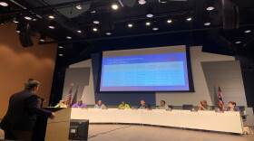 Daniel Hoying presents tax abatement formulas and history to Cincinnati Public School board and community members.