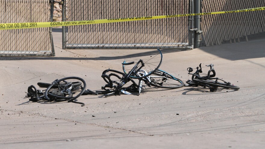 Broken bicycles sit in Show Low, Ariz., after a driver in a pickup truck plowed into bicyclists competing in a community road race in Arizona on Saturday.