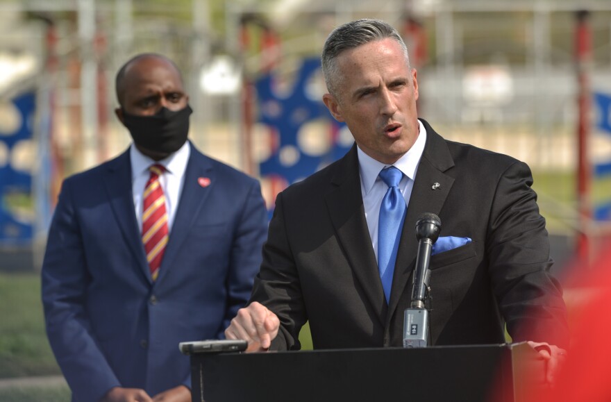 U.S. Attorney Tim Garrison, announces Monday that 518 arrests had been made by local and federal law enforcement officers as part of Operation LeGend in Kansas City. Garrison made the announcement in a joint press conference at Firehouse #18 with Kansas City Mayor Quinton Lucas (left) and Kansas City Police Chief Rick Smith.