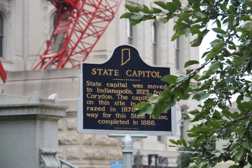 The state capitol marker sits on Capitol Avenue & W. Market Street at the east entrance to the State House, Indianapolis.