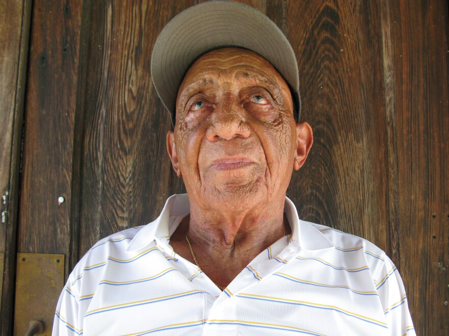 Lawrence Alexis, 93, a retired sugar-refinery worker, worries that grain dust from the proposed facility will ruin the community he has lived in for his entire life.