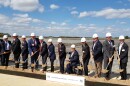 Aisin AW executives break ground with Gov. Abbott, Guadalupe County officials and Cibolo officials at the site of the $400 million automatic transmission plant.