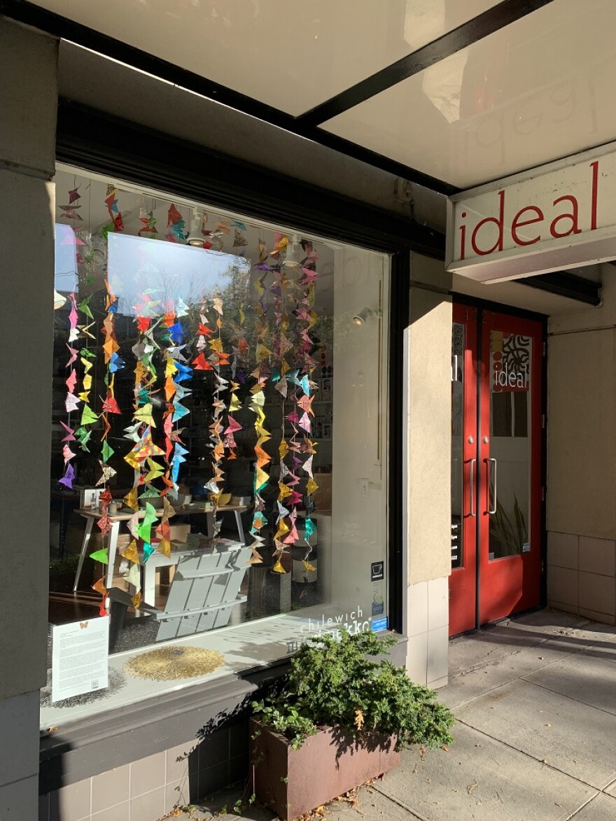 Storefronts in Whatcom County display origami butterflies in solidarity with the, "Migration Makes Us Stronger" campaign. (Photo: C2C Development)