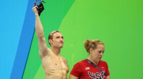 Bradley Snyder of the United States celebrates after winning gold at the Men's 100m Freestyle.