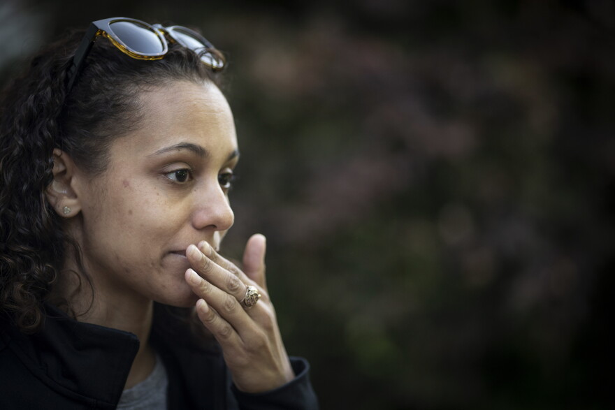 Catherine Manson holds back her tears while recounting a time when her son, Carter Manson, suffered an asthma attack at a friend's birthday party, in Hartford, Conn., on Wednesday, May 25, 2022. "He just kept saying 'I can't breathe, I can't breathe,''' she remembers. "I picked him up and told him it was OK and to just breathe. Just breathe."