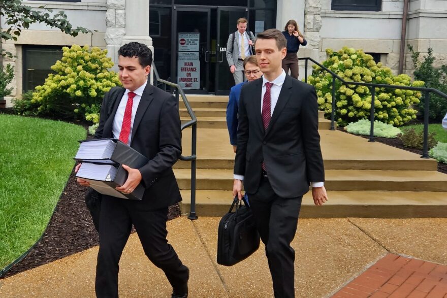 Lou Capozzi, right, solicitor general of Missouri, and Michael Patton of the attorney general’s office leave the Cole County Courthouse on Aug. 19, 2026, after the trial over whether Missourians will have a referendum on redistricting on the November ballot.