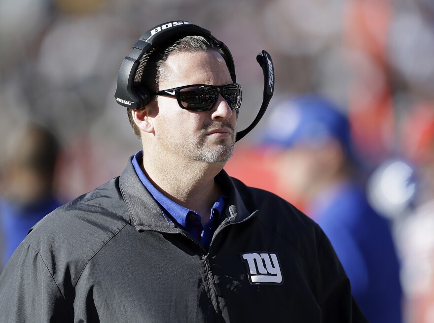 In this Dec. 3, 2017, file photo, then-New York Giants head coach Ben McAdoo watches the action during the first half of an NFL football game against the Oakland Raiders, in Oakland, Calif.