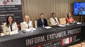 From left to right: Pam Howland, Jennifer Jones Hooft, Cody Earl, Megan Egbert, and Jennifer Walrath pose for a photos at a panel discussion Tuesday aimed at educating employers on how to respond to Idaho's bathroom bill.