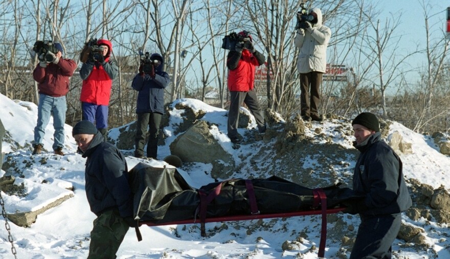 The body of informant John McIntyre being recovered in 2000.  Whitey Bulger is alleged to have killed McIntyre in 1984 after being tipped off that McIntyre was informing on him.