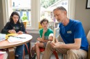 Simon Hand, a children’s librarian, shares his book pick — Jacob Have I Loved by Katherine Paterson — with the middle school book club he runs on July 30, 2026.