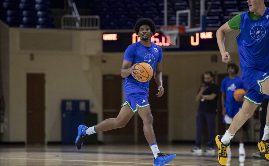 FGCU guard Elijah Brooks brings the ball up the court during practice on Monday, Sept. 21, 2026, at Alico Arena.