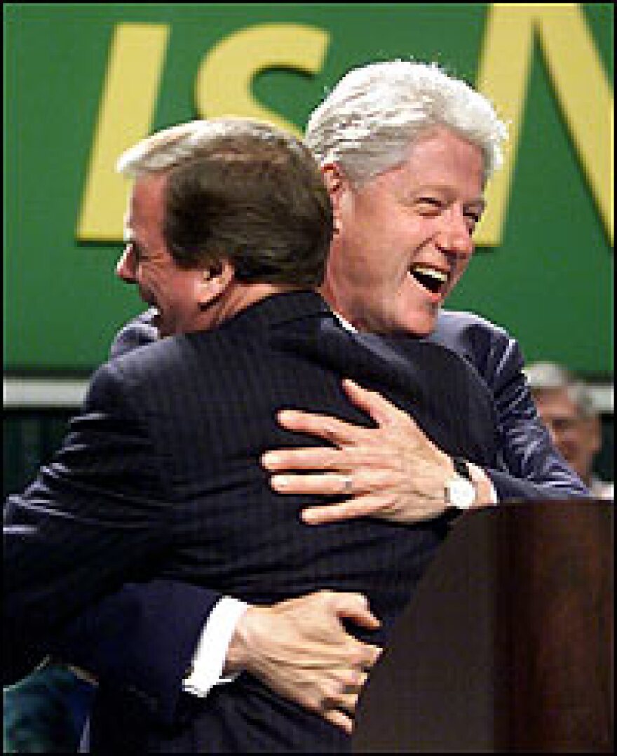 President Bill Clinton gets a bear hug from Gerald McEntee, president of AFSCME on June 30, 2000. McEntee now supports New York Sen. Hillary Clinton for president.