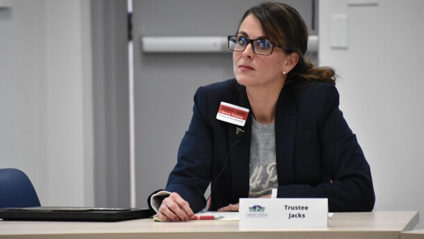 Library board trustee Gianna Jacks, photographed during a public meeting on April 15, 2025. Two community members accuse Jacks of harassing them after they criticized her during public comment.