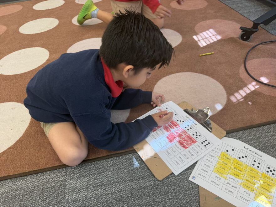 Seven-year-old Benjamin does math and reading at Momentous School in Dallas.