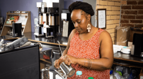 Nika Cotton makes a drink at Soulcentricitea, which she opened on Troost Ave. last July. Cotton applied for a grant from the Restaurant Revitalization Fund, but did not receive any money.