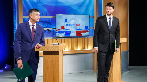 U.S. Rep. Tom Barrett, R-Charlotte, left, and Democratic nominee for U.S. House William Lawrence, right, after the conclusion of their first head-to-head debate at WKAR's studios in East Lansing, Mich., on Oct. 6, 2026.
