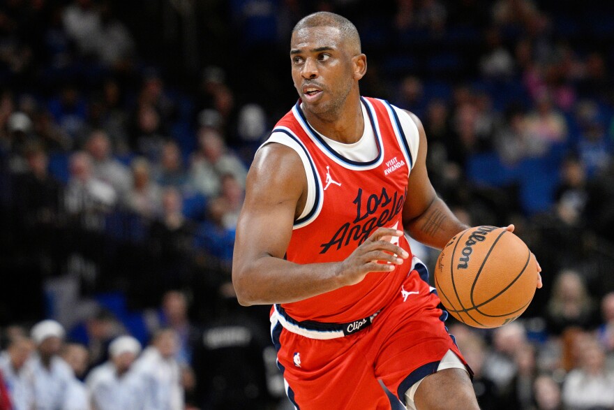 FILE - Los Angeles Clippers guard Chris Paul drives to the basket during the second half of an NBA basketball game against the Orlando Magic, Thursday, Nov. 20, 2025, in Orlando, Fla.
