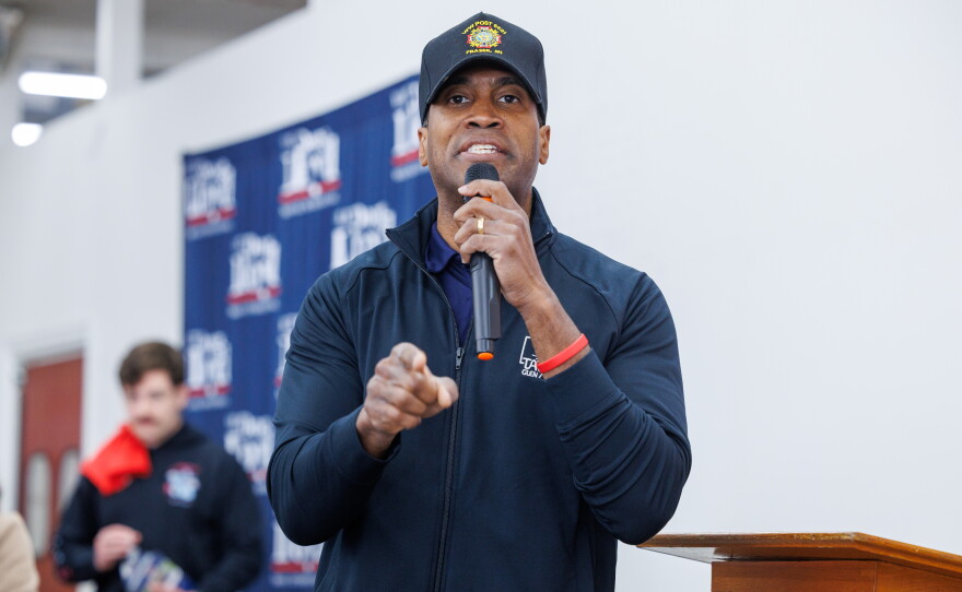 Republican nominee for governor John James speaks to volunteers in Lansing Township, Mich., on Oct. 24, 2026, during a stop on Republican U.S. Senate nominee Mike Rogers' "We Have a State to Save" bus tour.