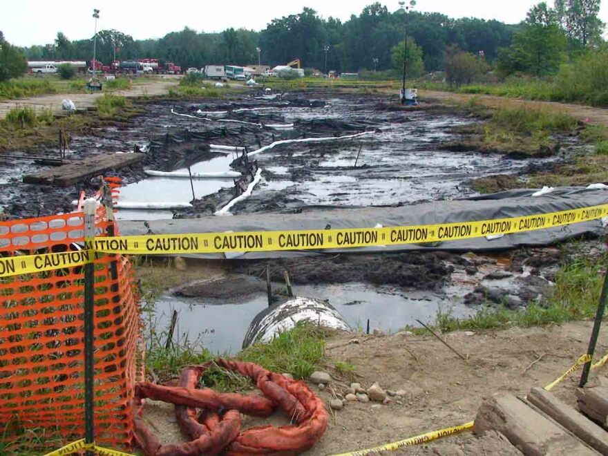 Oil-soaked Talmadge Creek during the cleanup. The Zinn family farm became a center of clean-up operations for Enbridge.