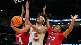 FILE - Alabama forward Amari Allen (5) makes a shot as he gets between Texas Tech guard Christian Anderson (4) and guard Leon Horner (6) during the second half in the second round of the NCAA college basketball tournament, March 22, 2026, in Tampa, Fla. (AP Photo/John Raoux, File)
