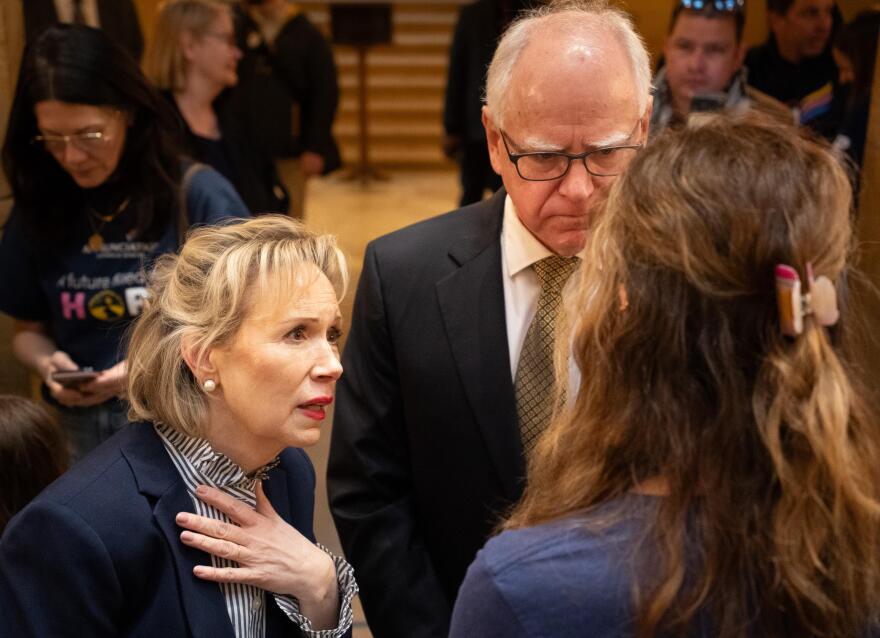 Gov. Tim Walz and First Lady Gwen Walz speak to parents and students from Annunciation School during a rally Thursday, Feb. 26, 2026, at the Minnesota Capitol.