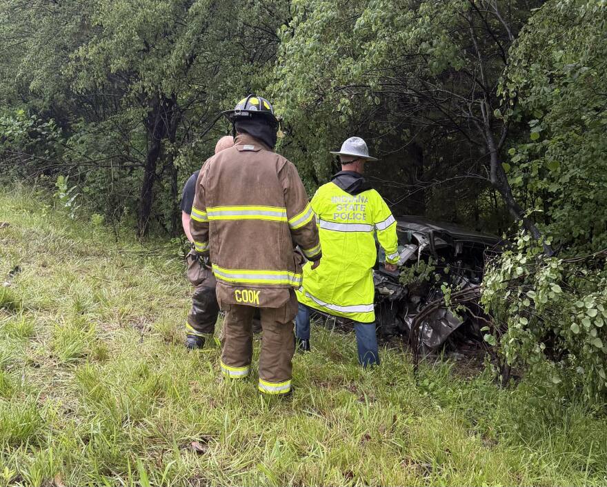 Responders investigate a vehicle off the roadway near State Road 64 and 161 in Dubois County, May 20, 2026