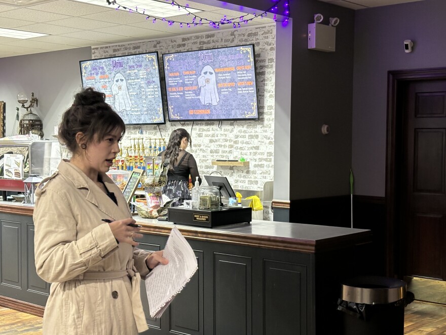 Jess Baranousky holds her notes at True Crime Tuesday.