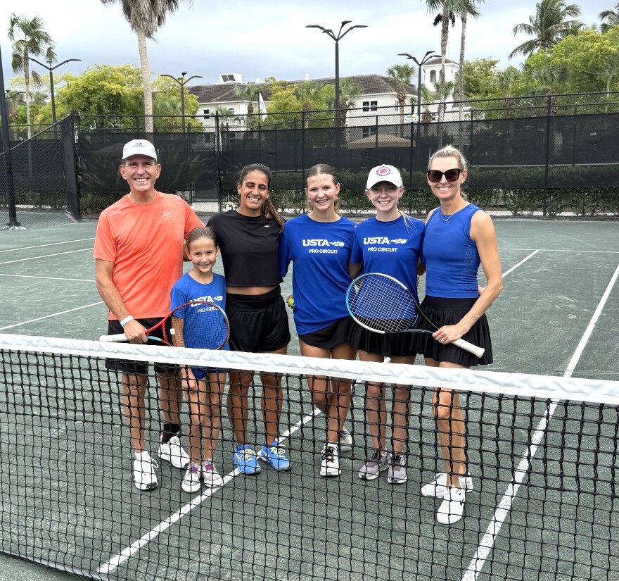 Teal Aroy's family hosted one of the players in the Finemark Women’s Pro Tennis Championship this year. Teal and her two older daughters also served as ball runners during the tournament.