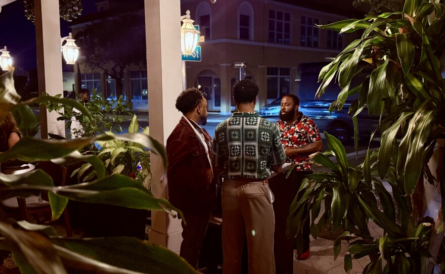 Professional staff handling reservations and walk-ins for Off The Clock, a new restaurant, listening bar, art gallery, and creative third space in Downtown Lake Worth Beach