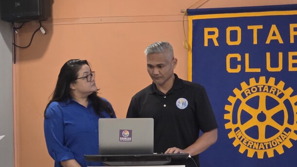 PSS Mental Health Program coordinator Walter Mendez and Counseling Program manager Paulette Tomokane speaking at the Rotary Club of Saipan on Feb. 10.
