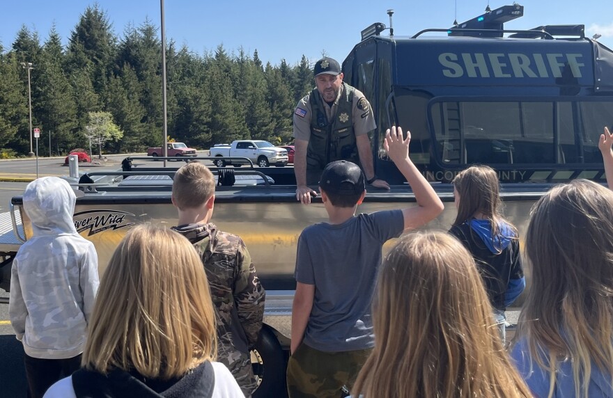 Lincoln County Deputy Dion Blake talks to students about boating and water safety as part of the sheriff’s marine patrol program.