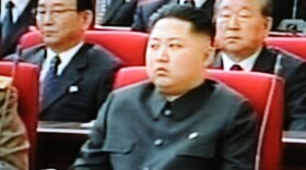 An image grab from North Korea's state-run Korean Central Television, broadcast on South Korean television and taken Thursday, shows the man experts believe is  Kim  Jong Un, North Korean leader  Kim  Jong Il's youngest son and likely heir, attending the Conference of the Workers' Party of Korea in Pyongyang on Tuesday.
