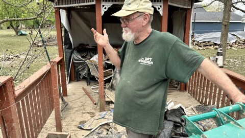 Utica resident Mike Morrow and his neighbors faced a muddy mess at their homes after Ohio River flood waters receded a few days ago.